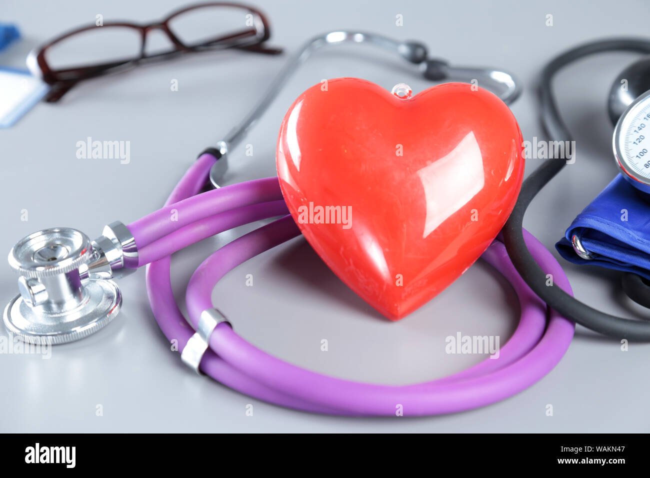 Red heart and a stethoscope on white background Stock Photo - Alamy