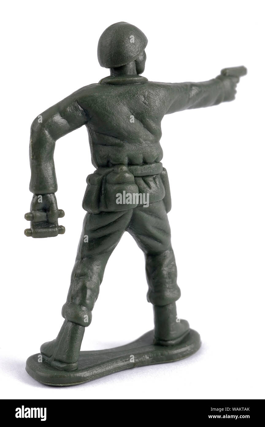 A toy soldier with his back to us on a white background Stock Photo