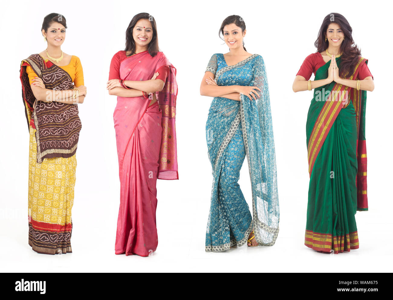 Four young woman standing together in sari Stock Photo