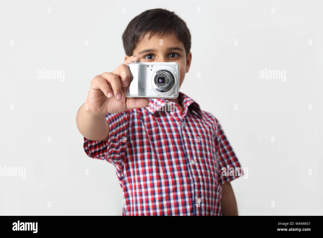 Boy taking picture digital camera hi-res stock photography and images ...