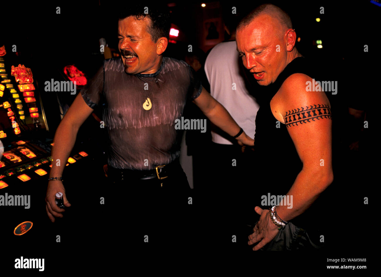 LGBTQ 1990s UK Gay men disco dancing Manchester nightclub England 1999 LGBT 90s UK HOMER SYKES Stock Photo