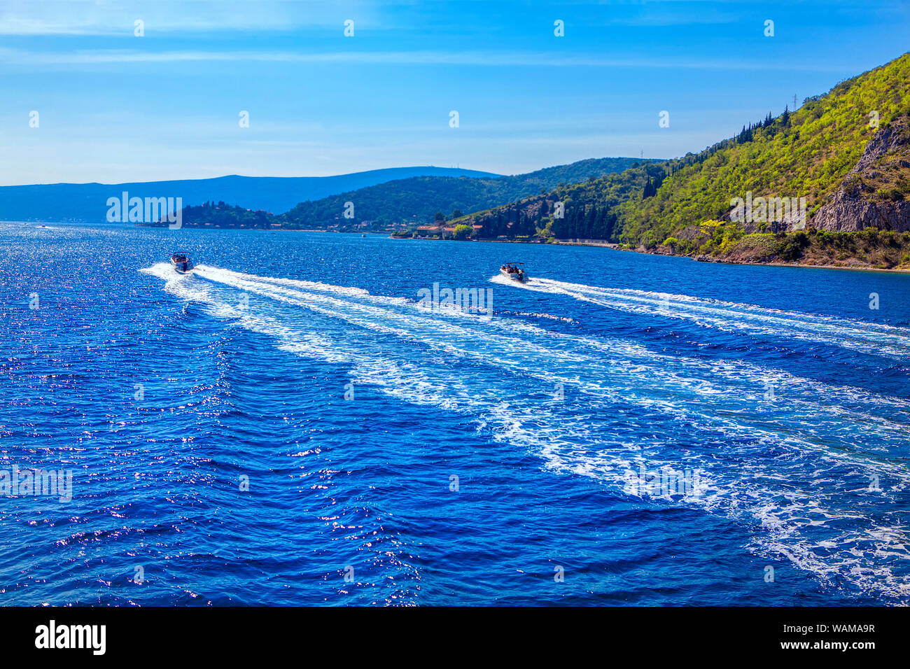 motorboat ride , trail on the blue water surface Stock Photo - Alamy
