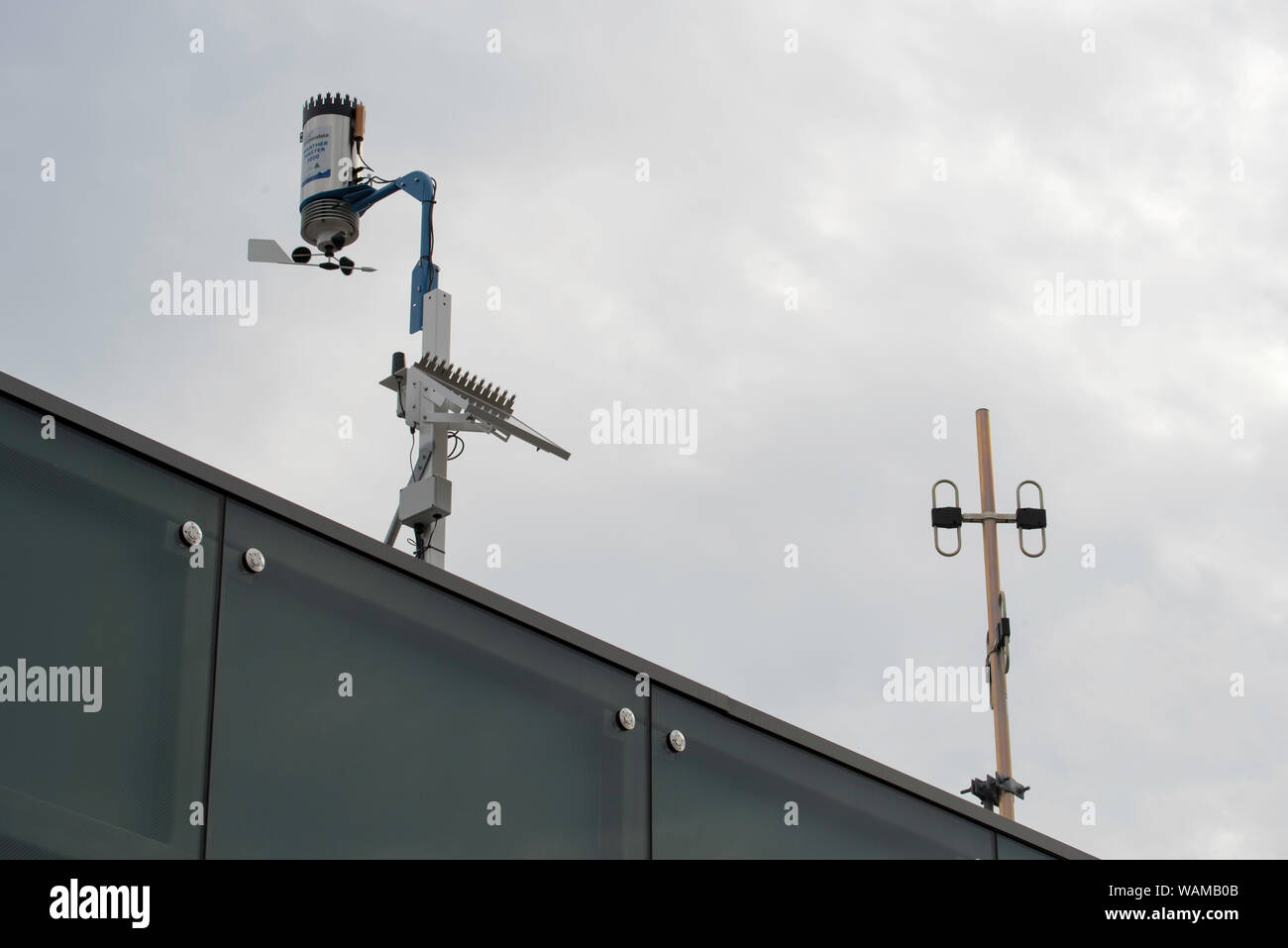A professional standard, remote controlled remote weather station mounted on a roof line at Sydney's Barangaroo Reserve Stock Photo