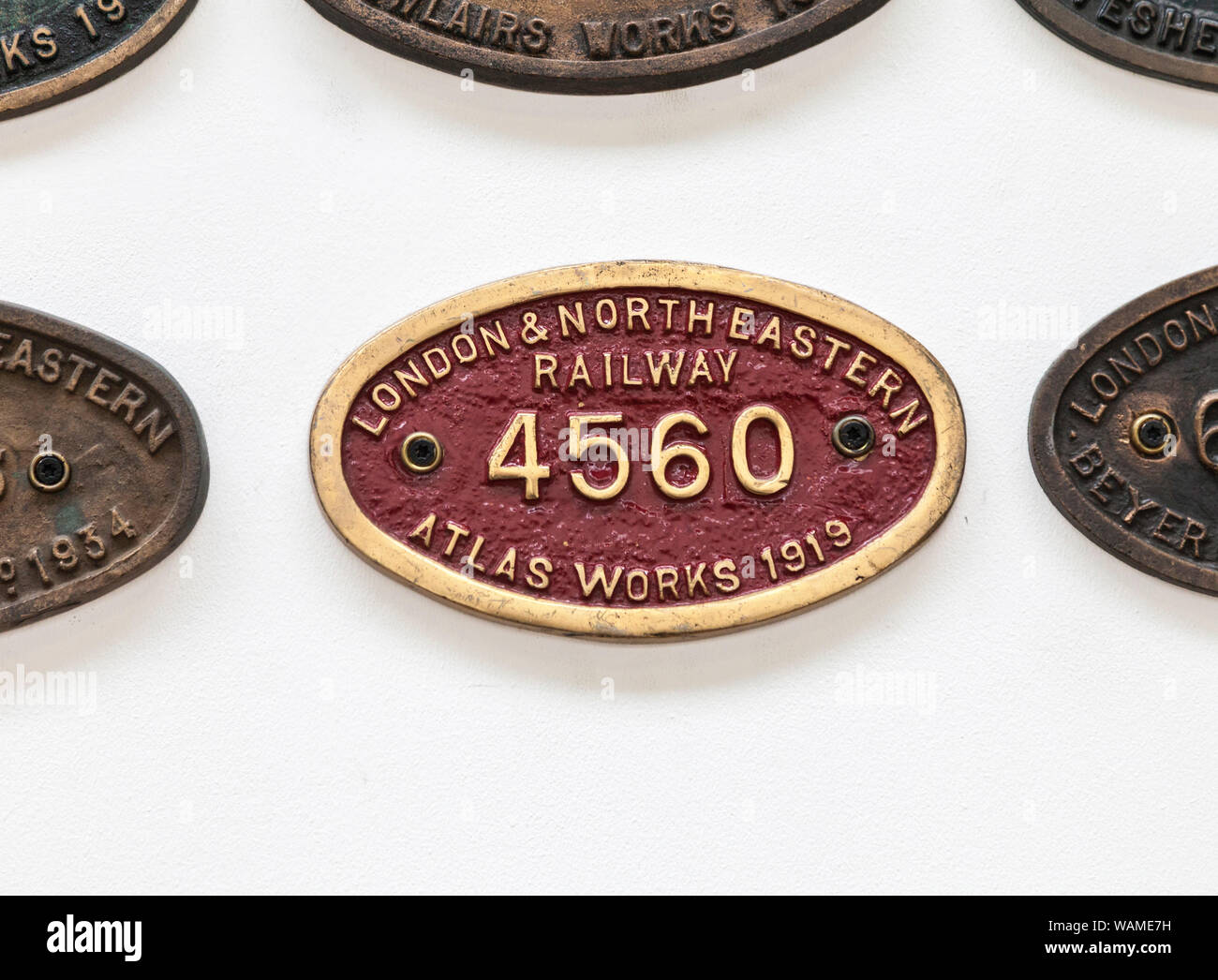 an-old-red-plaque-of-the-london-and-north-eastern-railway-with-the-number-4560-at-the-head-of-steam-railway-museum-in-darlingtonenglanduk-WAME7H.jpg
