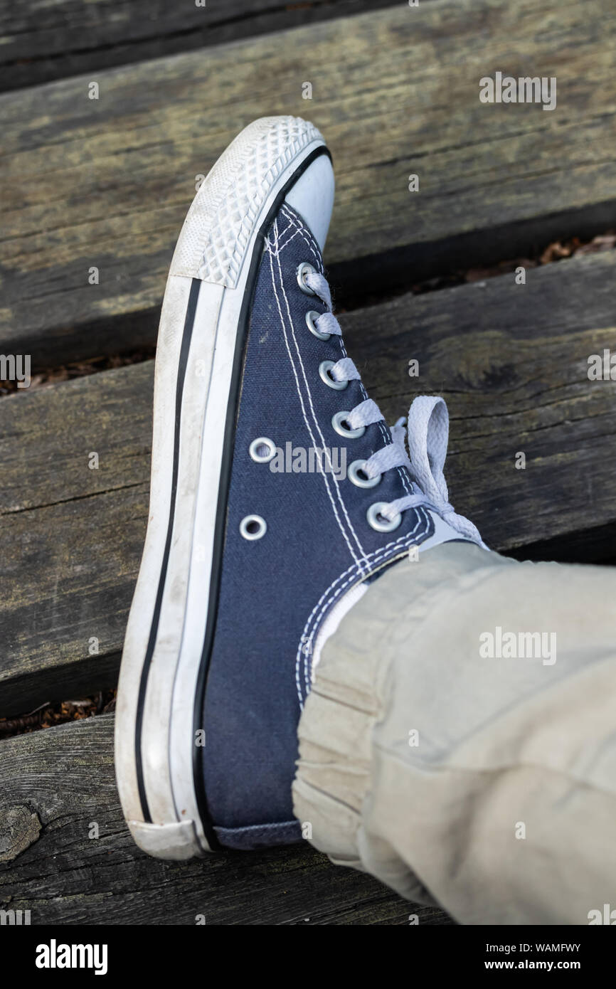 Blue converse sneakers hi-res stock photography and images - Page 3 - Alamy