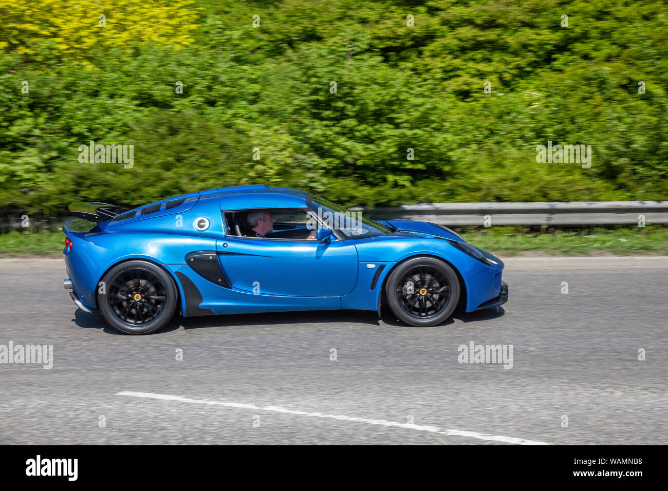 12 Blue Lotus Evora S 4 V6 Side View Motion Blur Moving Cars At Pendle Vintage Classic Supercar Festival Uk Stock Photo Alamy