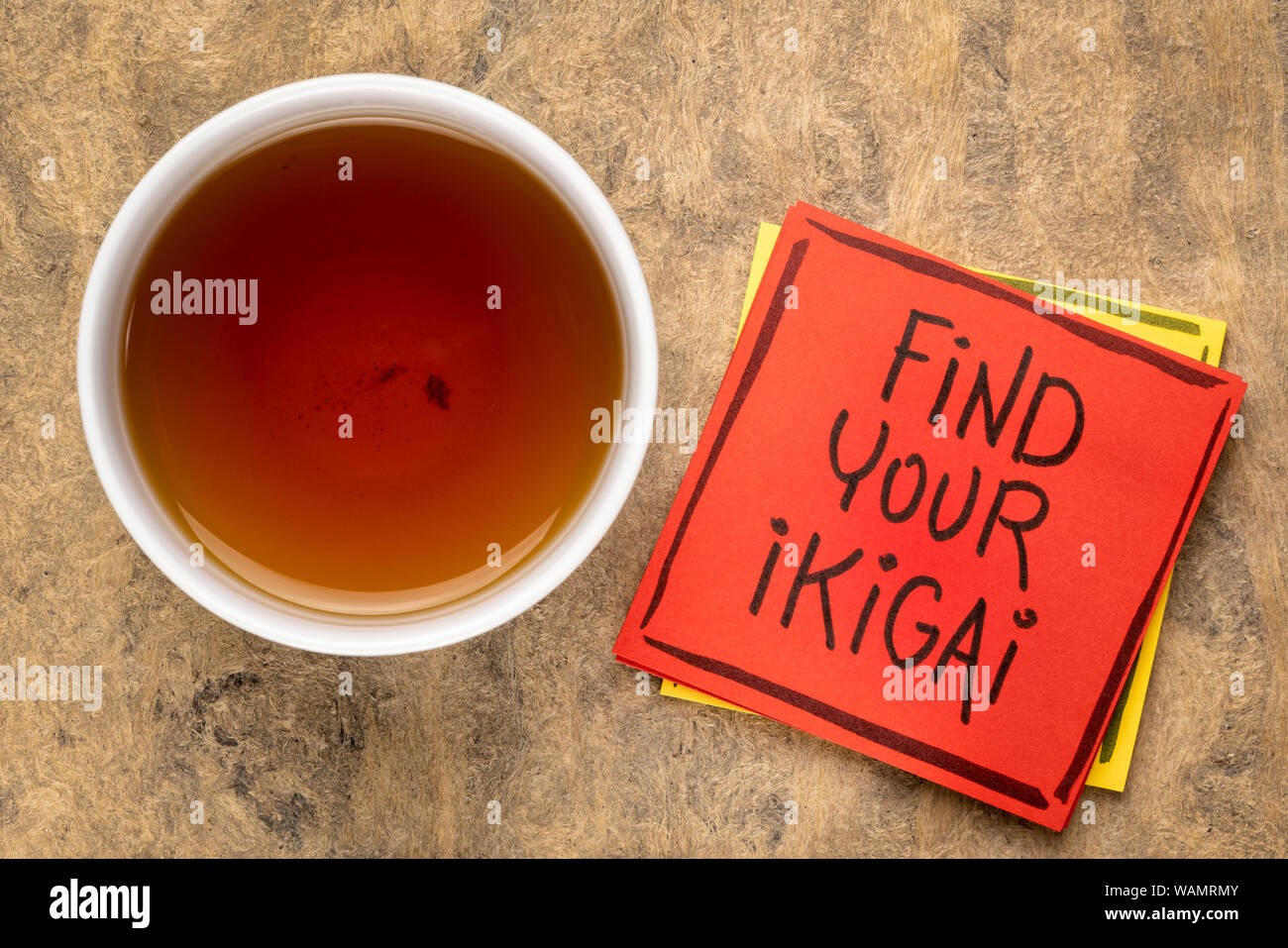 find your ikigai handwriting, reminder note with a cup of tea