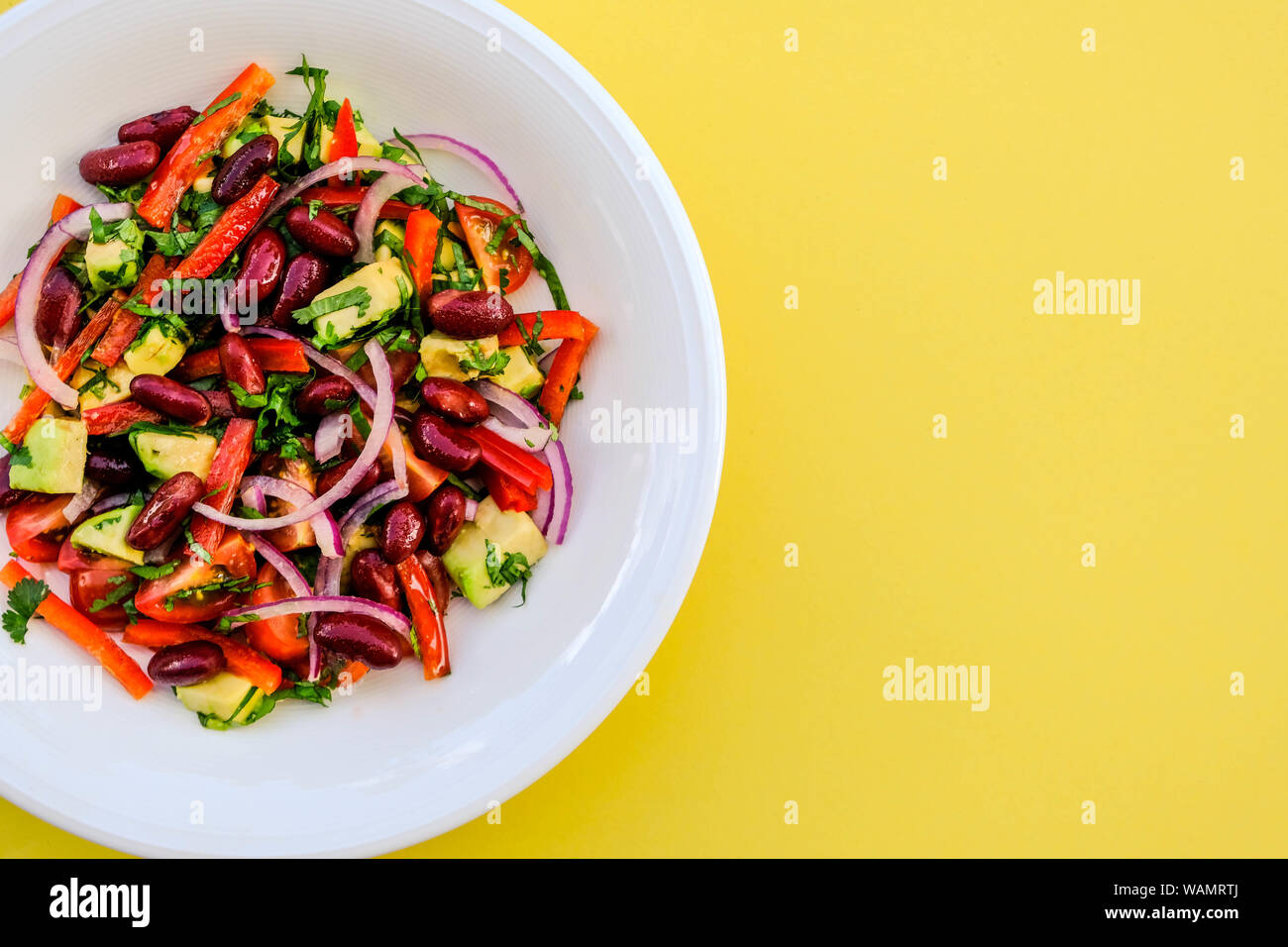 Healthy Vegetarian Avocado and Kidney Bean Summer Salad With Cherry