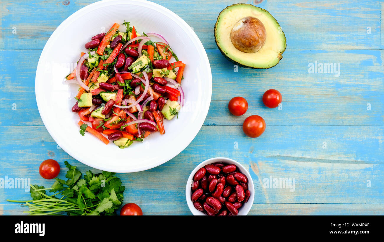 Healthy Vegetarian Avocado and Kidney Bean Summer Salad With Cherry