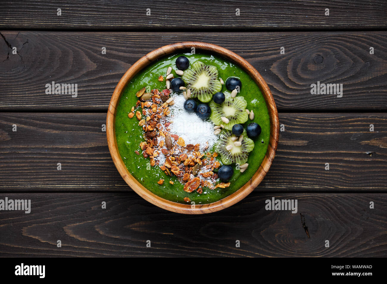 Smoothie bowls. Healthy breakfast bowl with chia seeds, muesli, berries