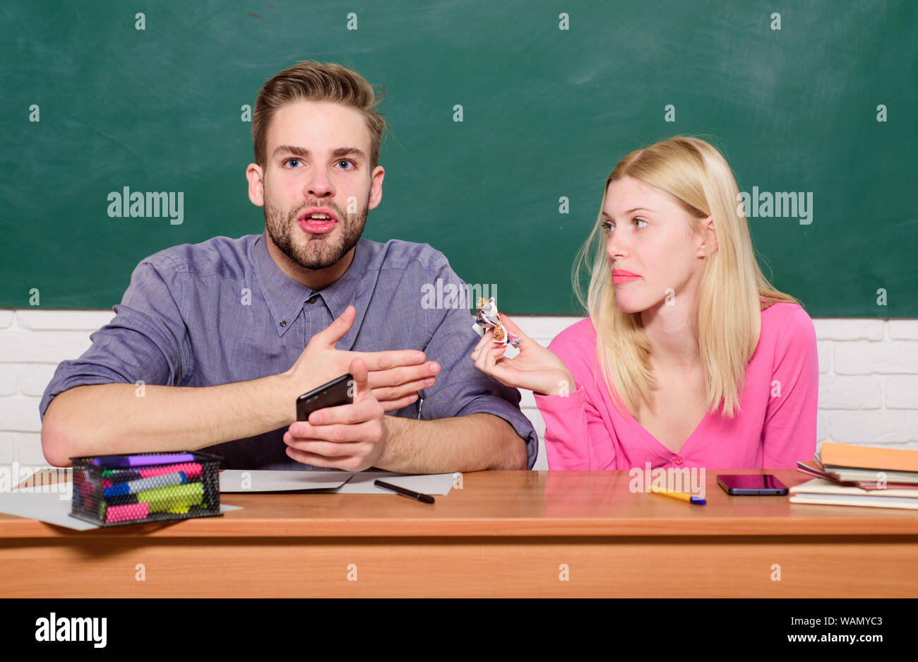 Modern school. Knowledge day. Back to school. Couple of man and woman ...