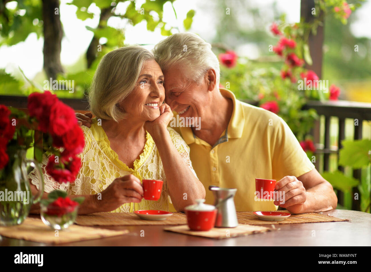 Portrait happy couple on porch hi-res stock photography and images - Alamy