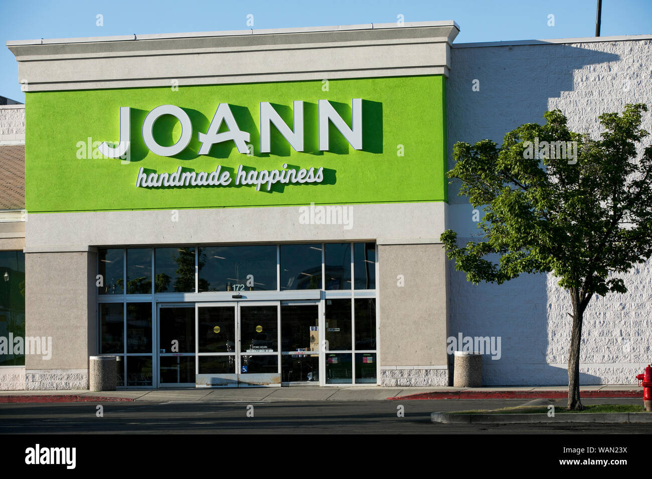 A logo sign outside of a JoAnn retail store location in Orem, Utah on