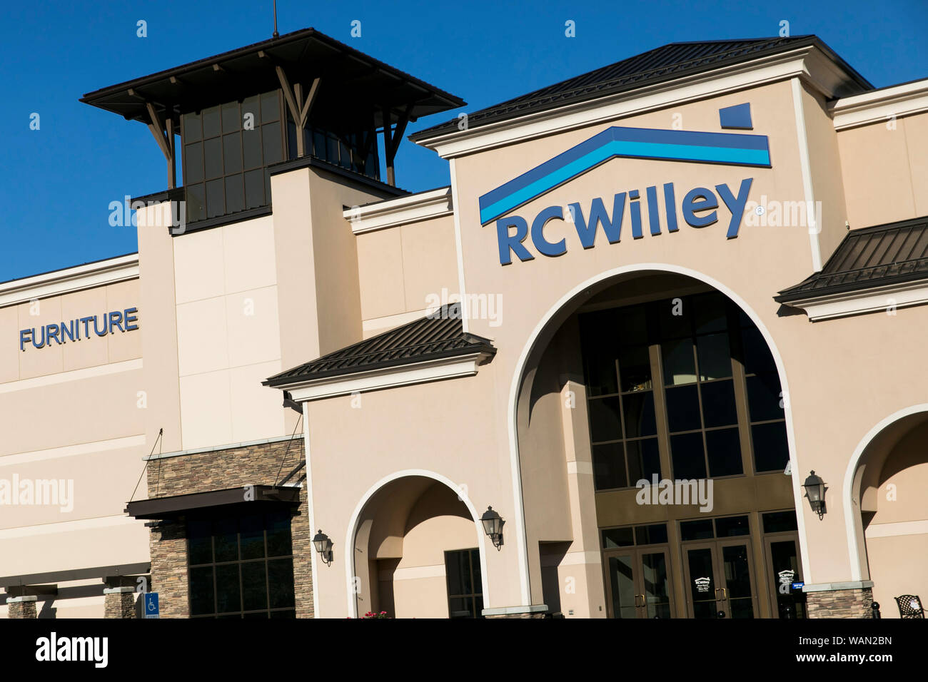 A logo sign outside of a RC Willey Home Furnishings retail store location in Orem, Utah on July 29, 2019. Stock Photo