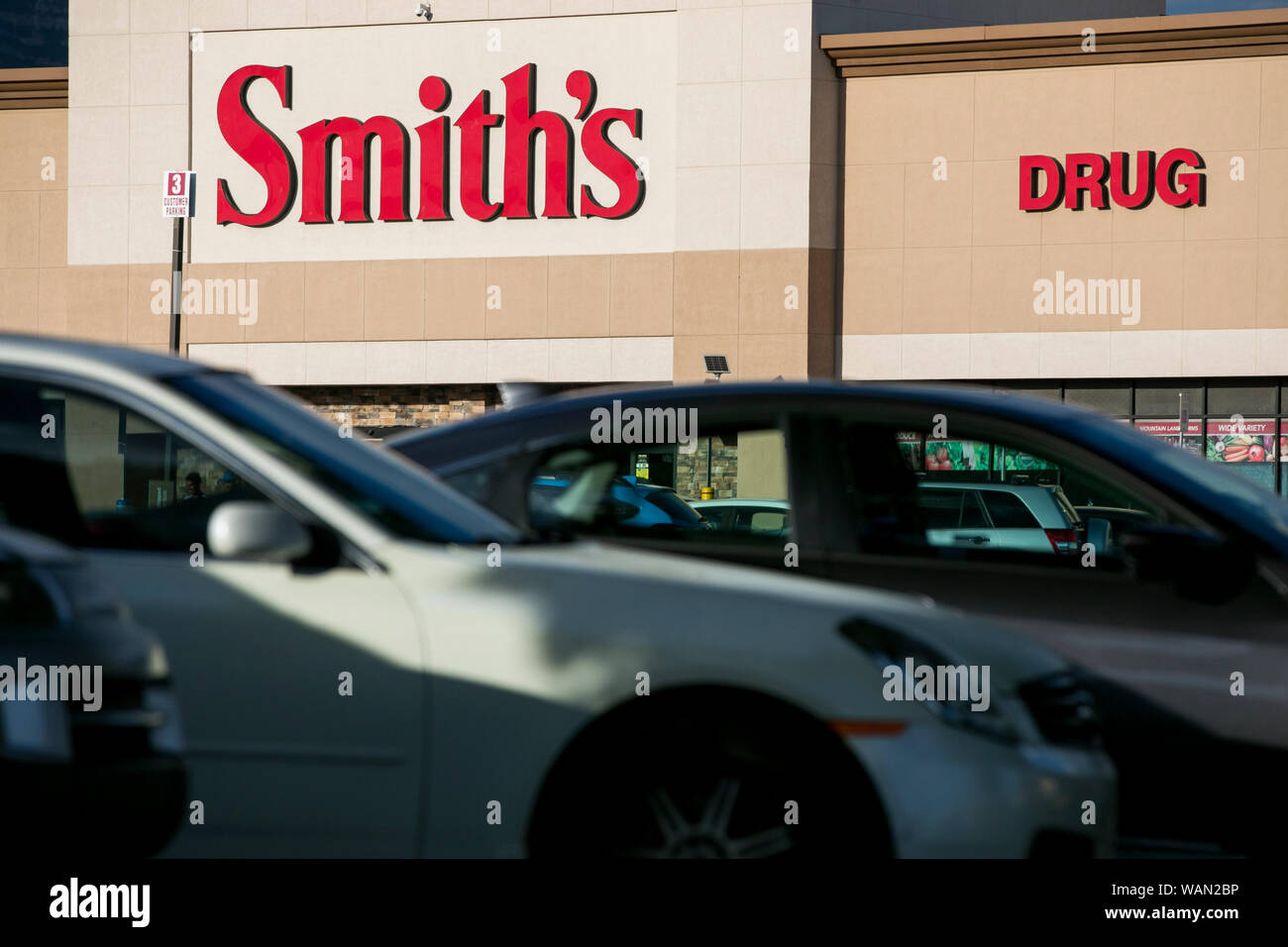 A logo sign outside of a Smith's Food and Drug retail grocery store location in Orem, Utah on July 29, 2019. Stock Photo