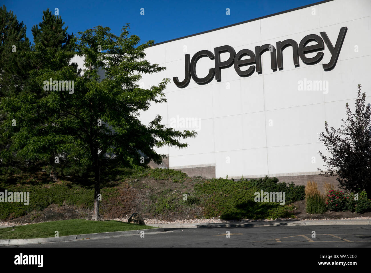 A logo sign outside of a JC Penney retail store location in Provo, Utah on July 29, 2019. Stock Photo