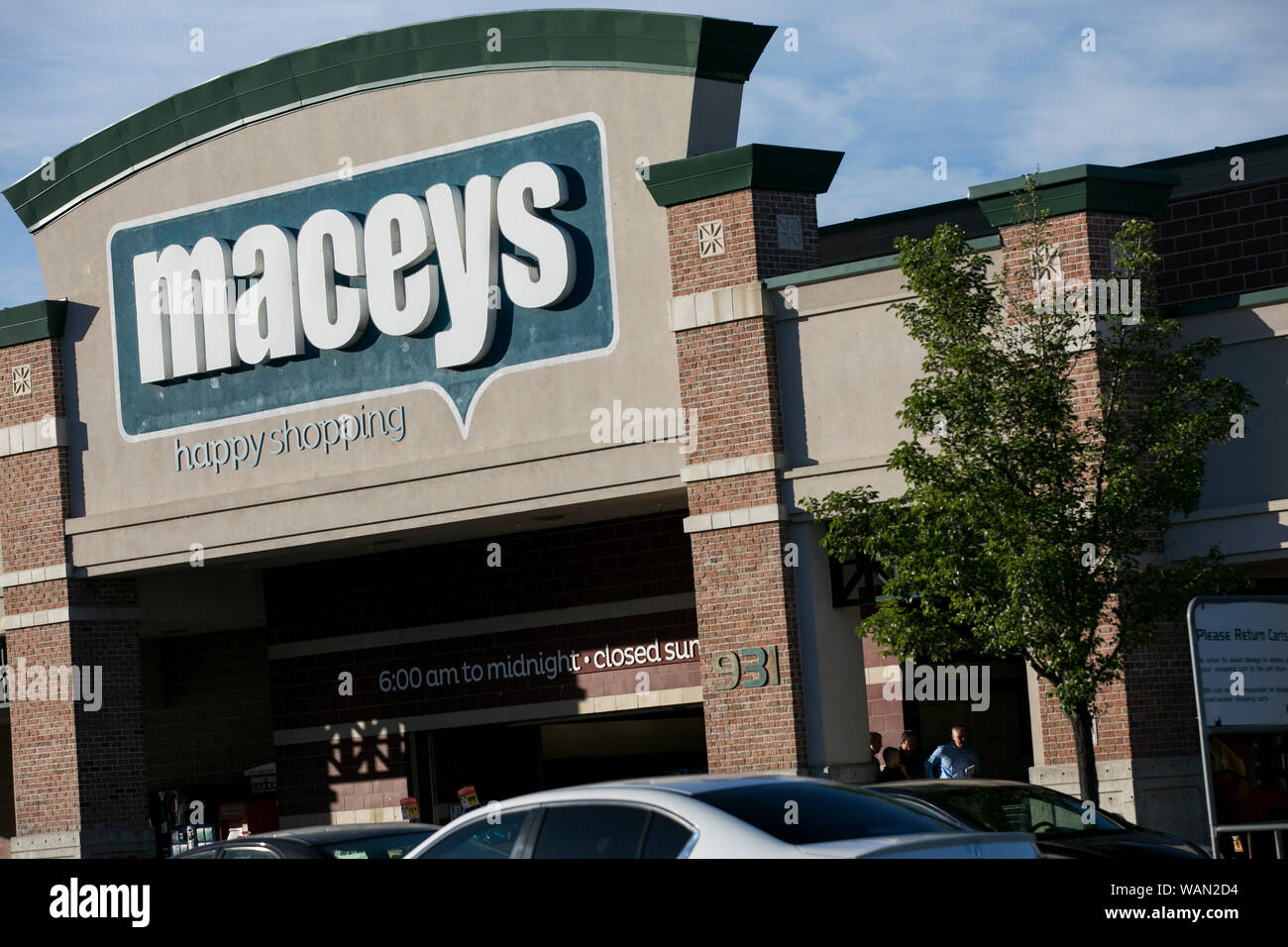 A logo sign outside of a Macey's retail grocery store location in