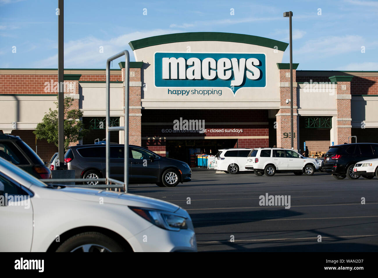 A logo sign outside of a Macey's retail grocery store location in