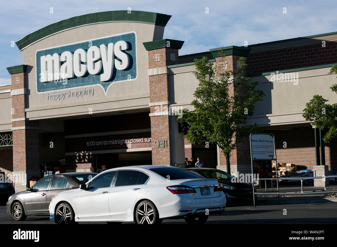 A logo sign outside of a Macey's retail grocery store location in