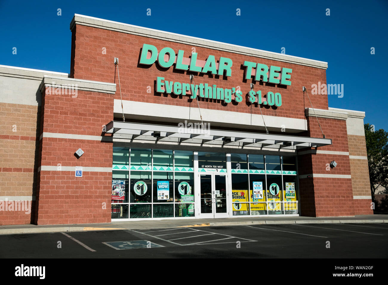 A logo sign outside of a Dollar Tree retail store location in American