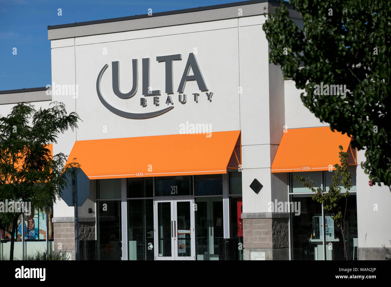A logo sign outside of a Ulta Beauty retail store location in American