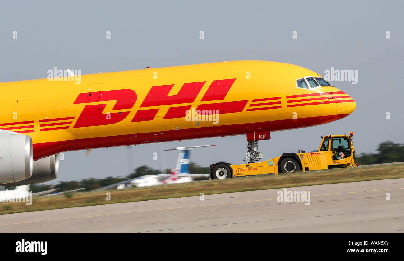Schkeuditz, Germany. 21st Aug, 2019. A DHL cargo aircraft is towed to ...