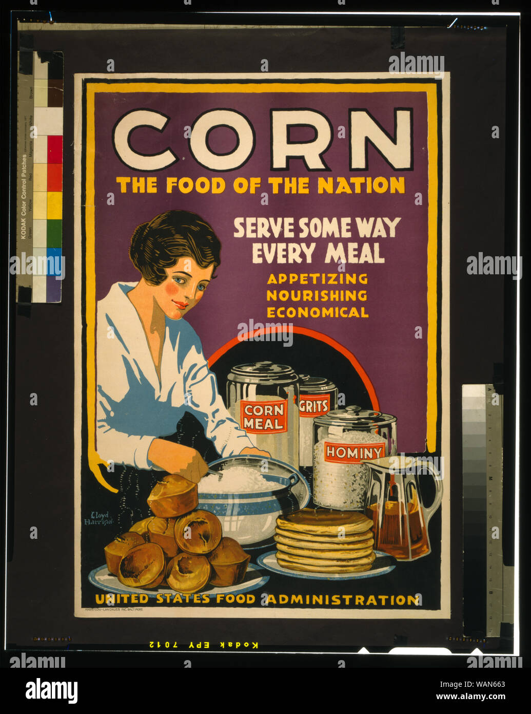 Corn - the food of the nation Abstract: Poster showing a woman serving muffins, pancakes, and grits, with cannisters on the table labeled corn meal, grits, and hominy. Stock Photo