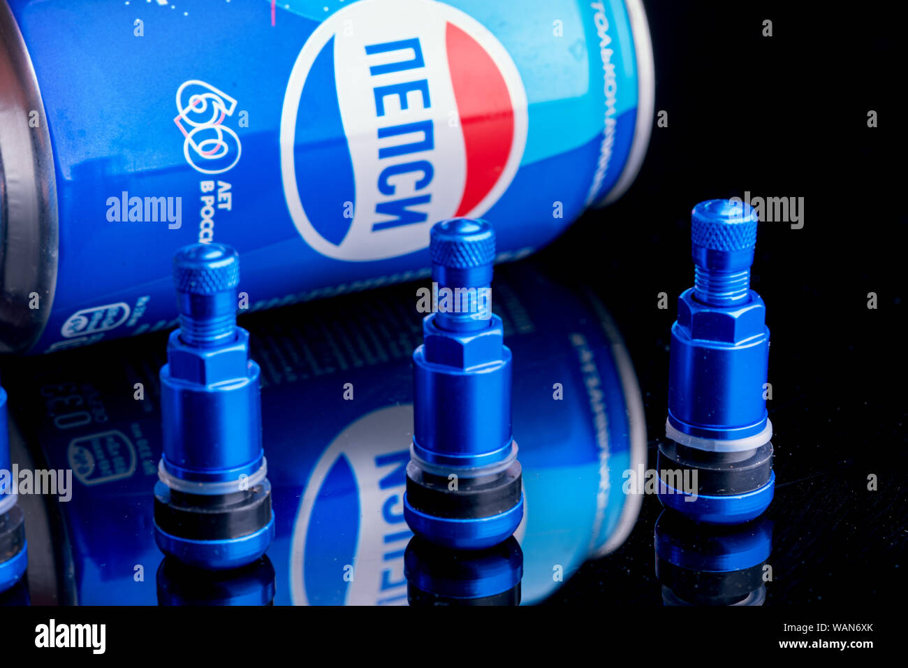 Consumables for tire repair, new blue nipples for car tires and a can