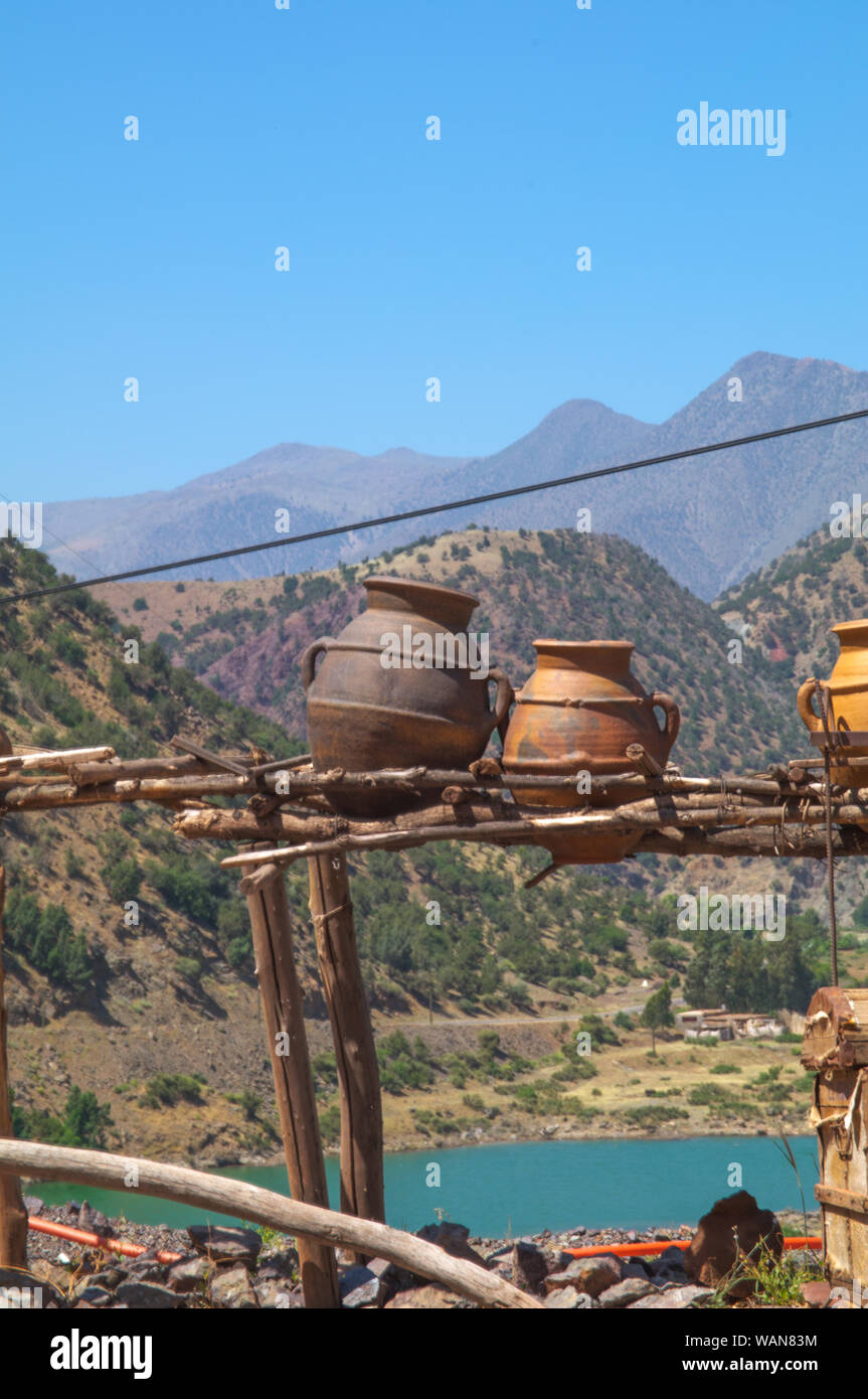 Panorama of mountain with clay pots in the foreground. Stock Photo
