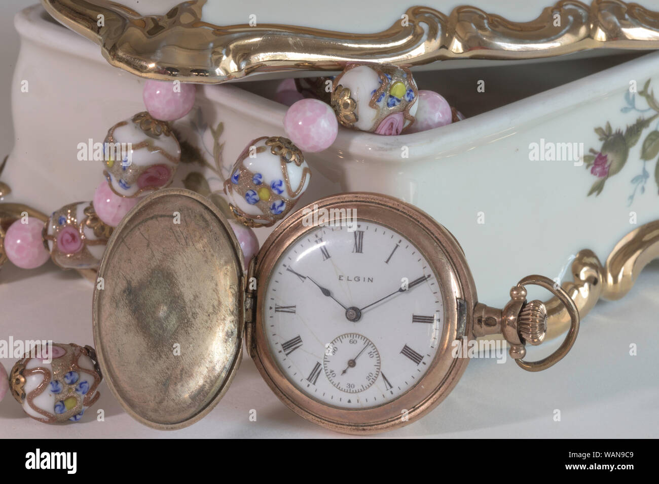 Still life with vintage Elgin Pocket Watch, USA Stock Photo