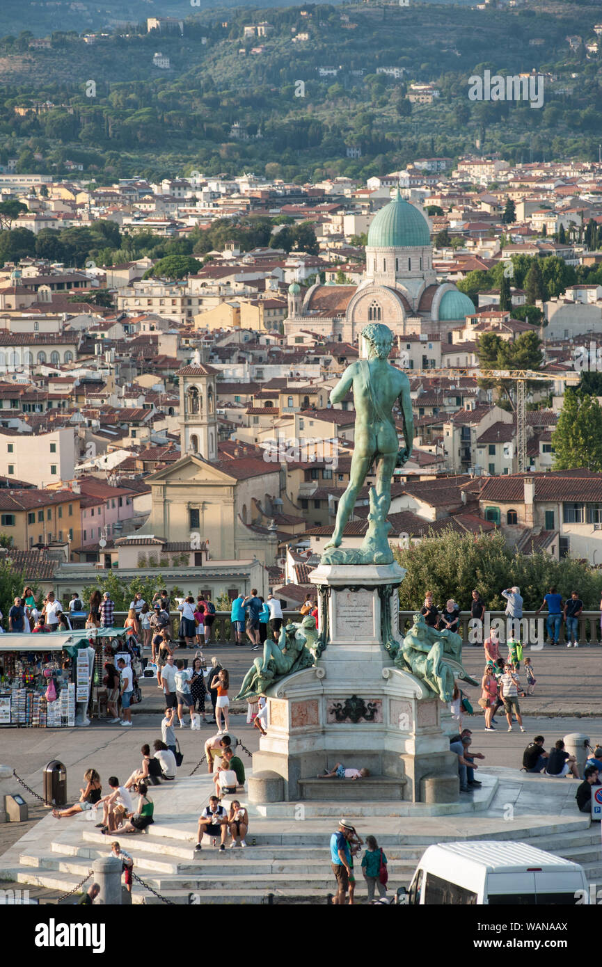 Florence, Italy - 2019, August 16: David statue at Piazzale Michelangelo.Tourists and visitors crowd the square in a summer day. Stock Photo