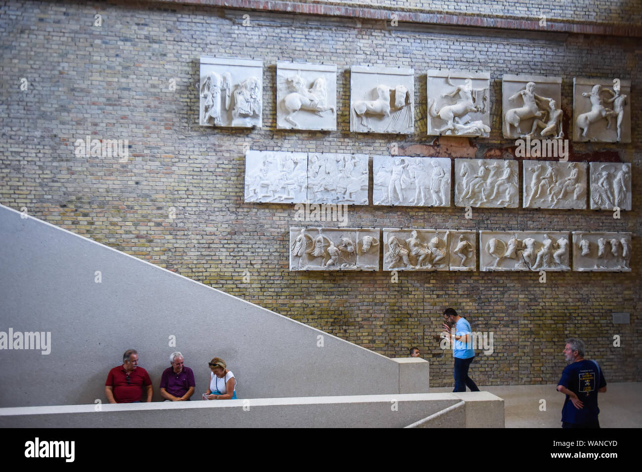 Berlin, Germany. 20th Aug, 2019. Visitors admire an artefact as they