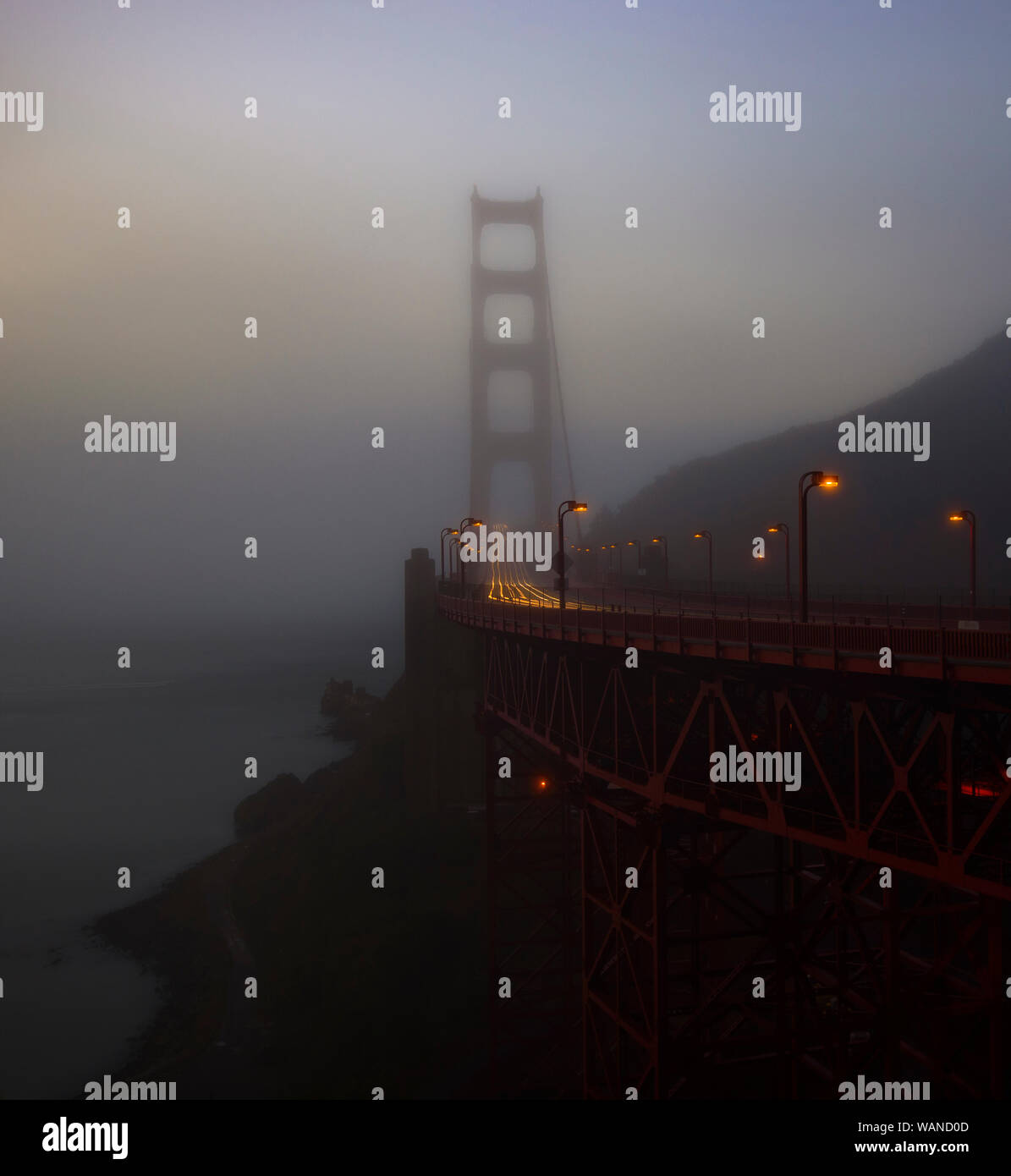 Foggy Light trails on the Golden Gate Bridge Stock Photo
