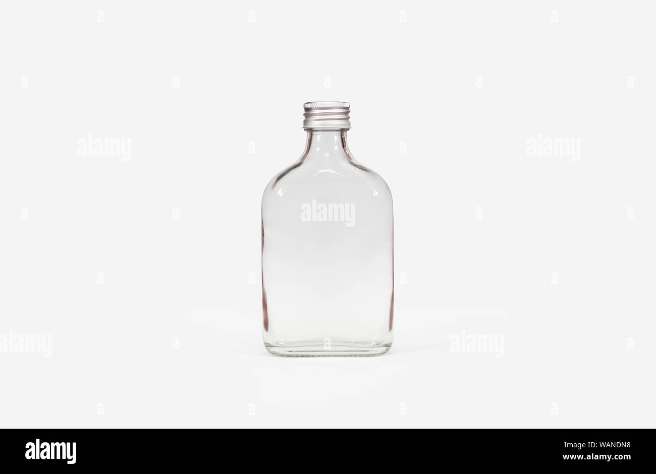 Isolated clear glass bottle white background with clipping path Stock