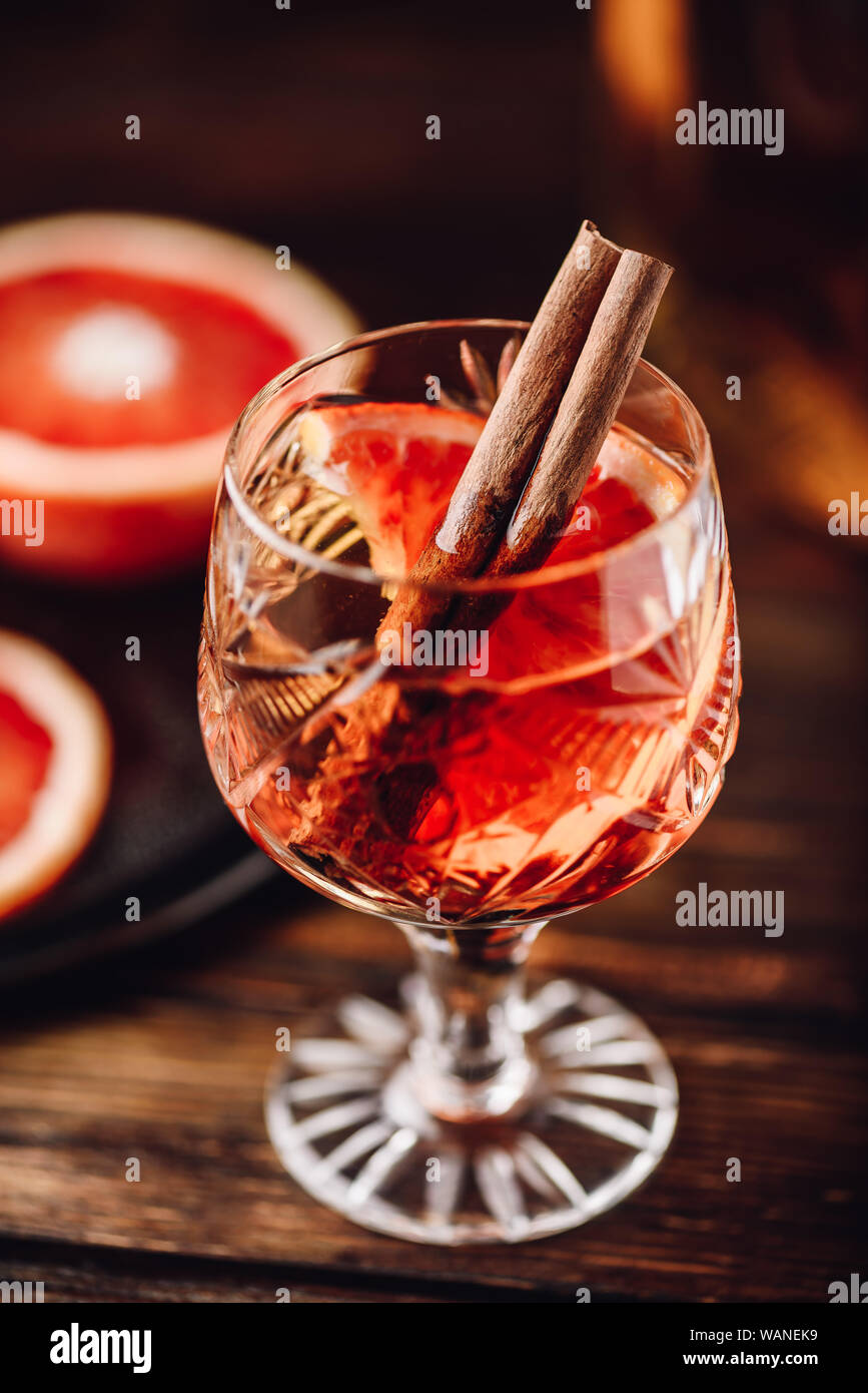 Blood orange whiskey sour cocktail with aged bourbon, blood orange juice, cherry syrup and cinnamon Stock Photo