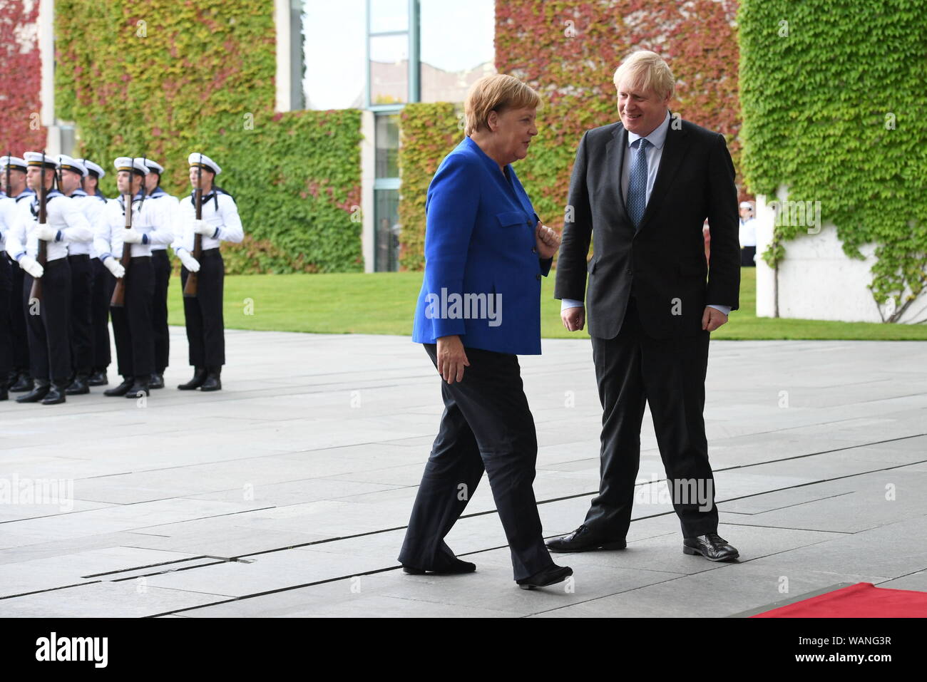 Prime Minister Boris Johnson with German Chancellor Angela Merkel in Berlin as he arrives ahead of talks to try to break the Brexit deadlock. Stock Photo