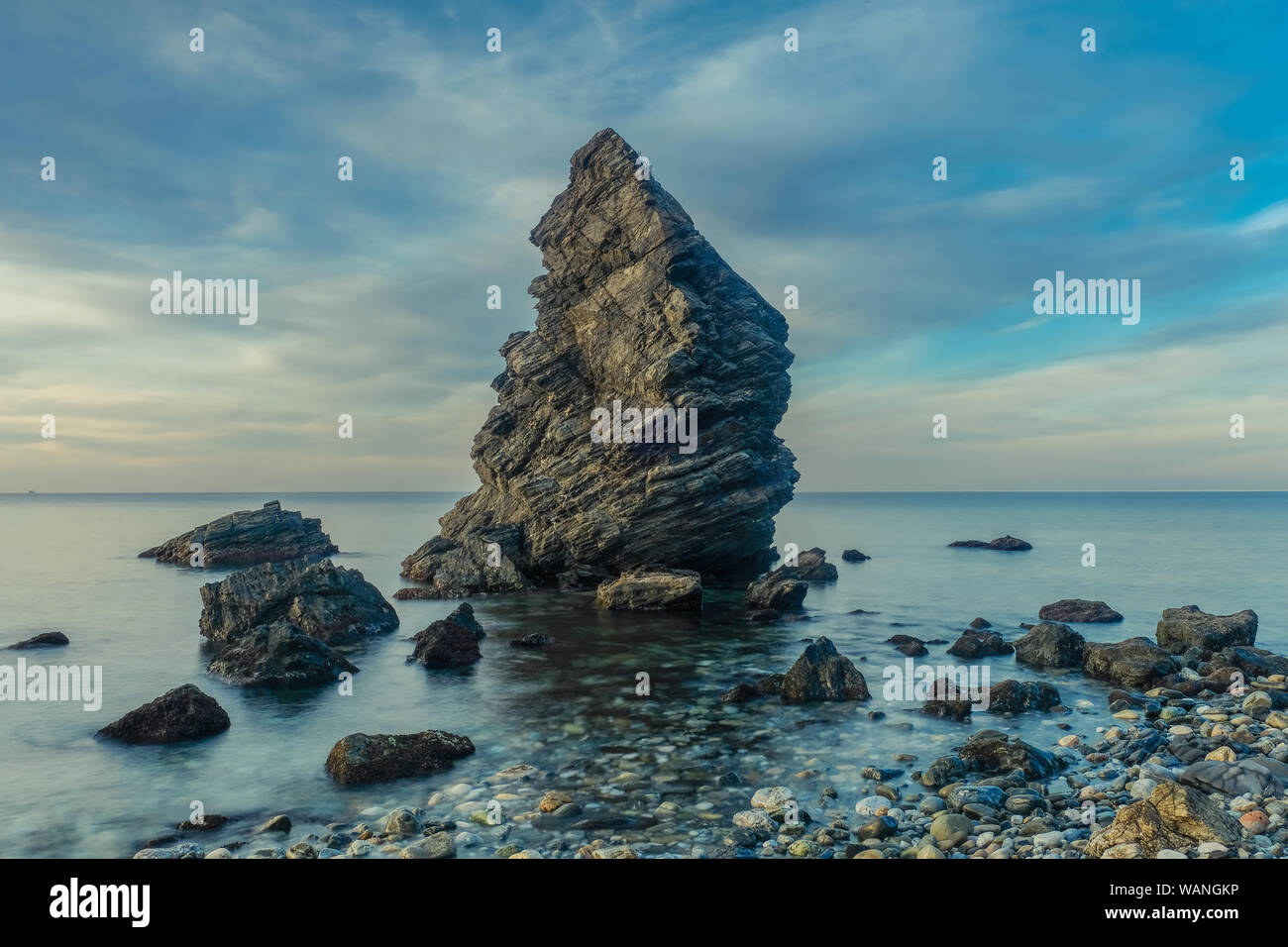 Nerja, Malaga, Andalusi, Spain - February 7, 2019: Molino Beach, small stone  beach with large rock on the shore, Nerja, southern Spain Stock Photo -  Alamy