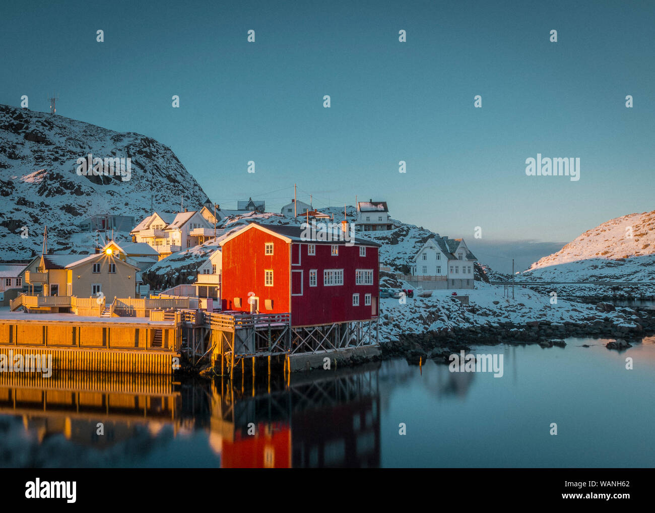Red Houses and beautiful mountains in Stunning Norway Stock Photo
