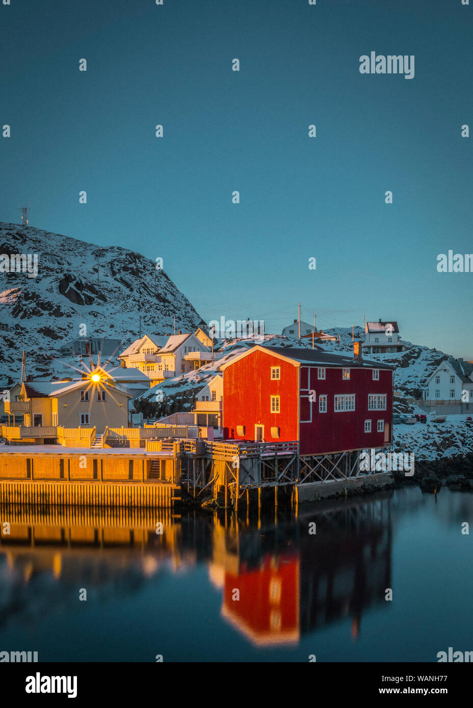 Red Houses and beautiful mountains in Stunning Norway Stock Photo