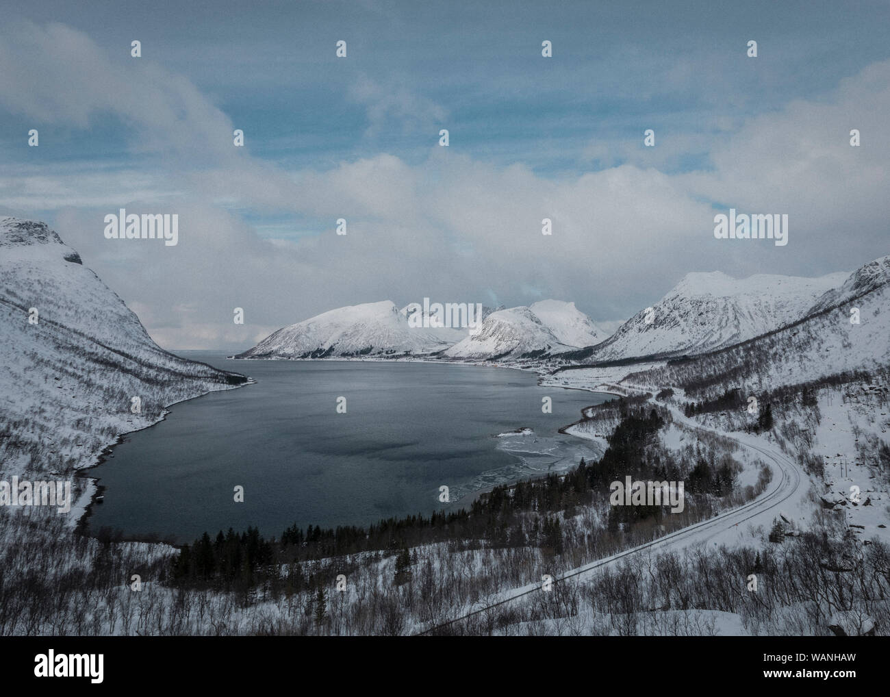 Winter lake and beautiful mountains in stunning Norway Stock Photo