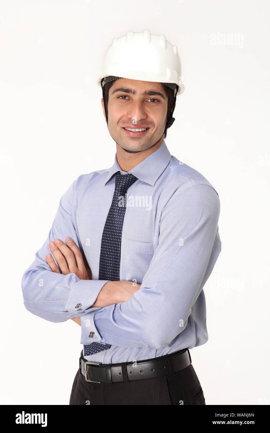 Supervisor smiling crossed arms hi-res stock photography and images - Alamy