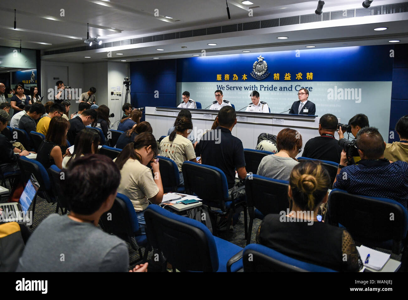(190821) -- HONG KONG, Aug. 21, 2019 (Xinhua) -- Photo taken on Aug. 21, 2019 shows the scene of a press conference held by Hong Kong police in south China's Hong Kong. Hong Kong police on Wednesday called on all journalists to respect each other's freedom of news coverage after a female reporter from the mainland was surrounded by her Hong Kong peers questioning her identity after a press conference on Tuesday. The police have existing measures to effectively verify reporters' identity, consistent with that of other press conferences of the Hong Kong Special Administrative Region (HKSAR) g Stock Photo