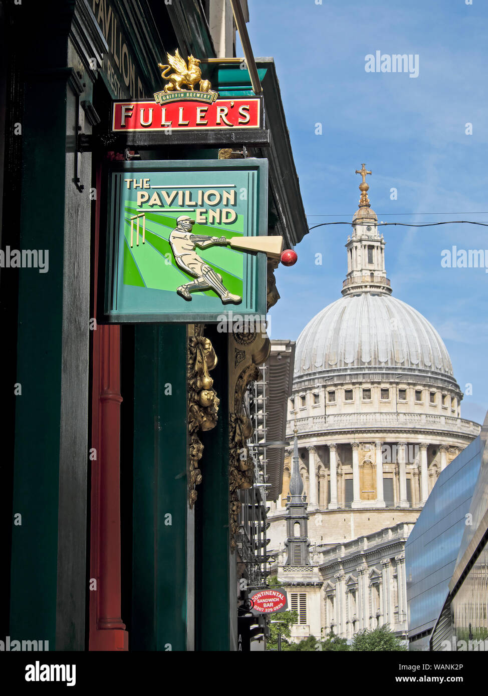 St Pauls Cathedral and vertical view of The Pavilion End pub & Fullers brewery sign in Watling Street City of London EC4 England UK  KATHY DEWITT Stock Photo