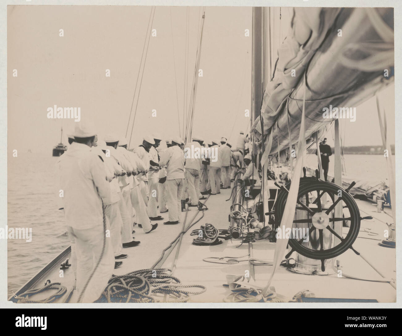 Crew handling rigging on the yacht Reliance, winner of 1903 America's Cup Stock Photo