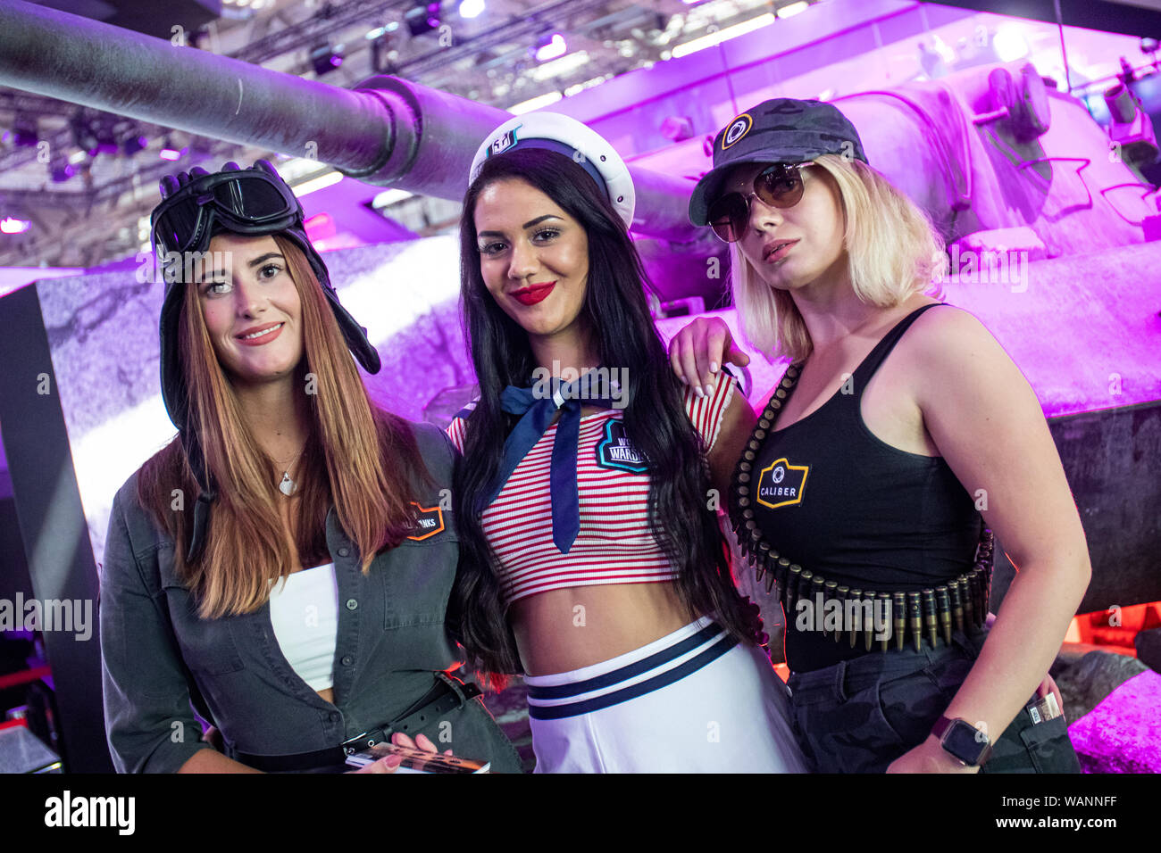 Cologne, Germany. 20th Aug, 2019. Gamescom 2019: Promoters in military uniform presenting war games of publisher Wargaming.net like World of Tanks or World of Warships. Gamescom is the world's largest trade fair for computer and video games, at Koelnmesse in Cologne, Germany, from 20th to 24th August 2019. Photocredit: Christian Lademann Stock Photo