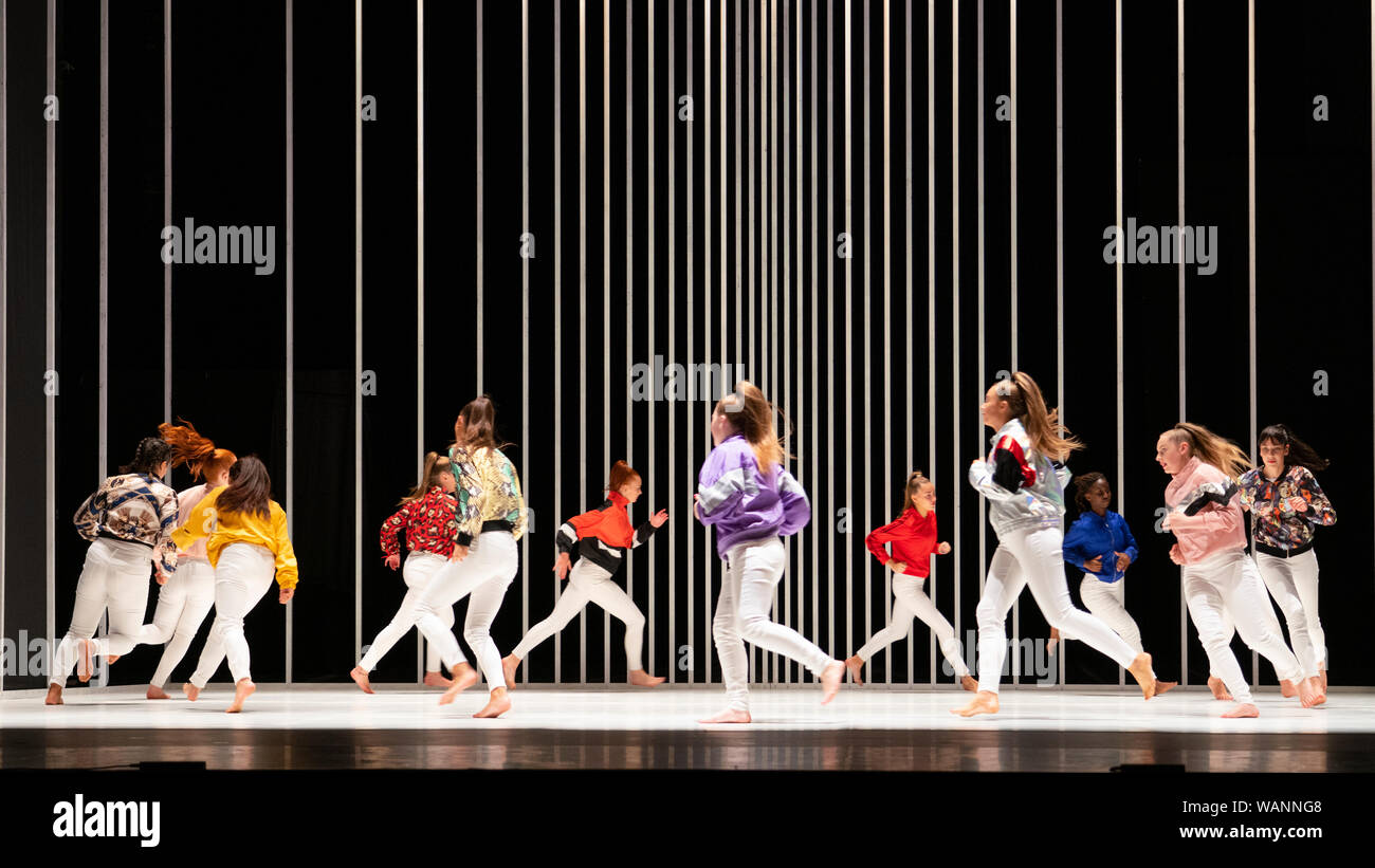 Edinburgh, Scotland, UK. 21 August 2019. Pictured; Young local dancers forming the Scottish ÒSugar ArmyÓ performing in Hard to Be Soft: A Belfast Prayer by Oona Doherty and Prime Cut Productions at the Lyceum Theatre at the Edinburgh International festival. Hard to Be Soft is a dance piece which looks behind the masks of violence and machismo to the inner lives of Belfast hard men and strong women. Cast in four episodes, Hard to Be Soft features solos from Doherty herself, a warrior-like hip-hop dance group, and a choreographed wrestling match for a male duet. Iain Masterton/Alamy Live News. Stock Photo