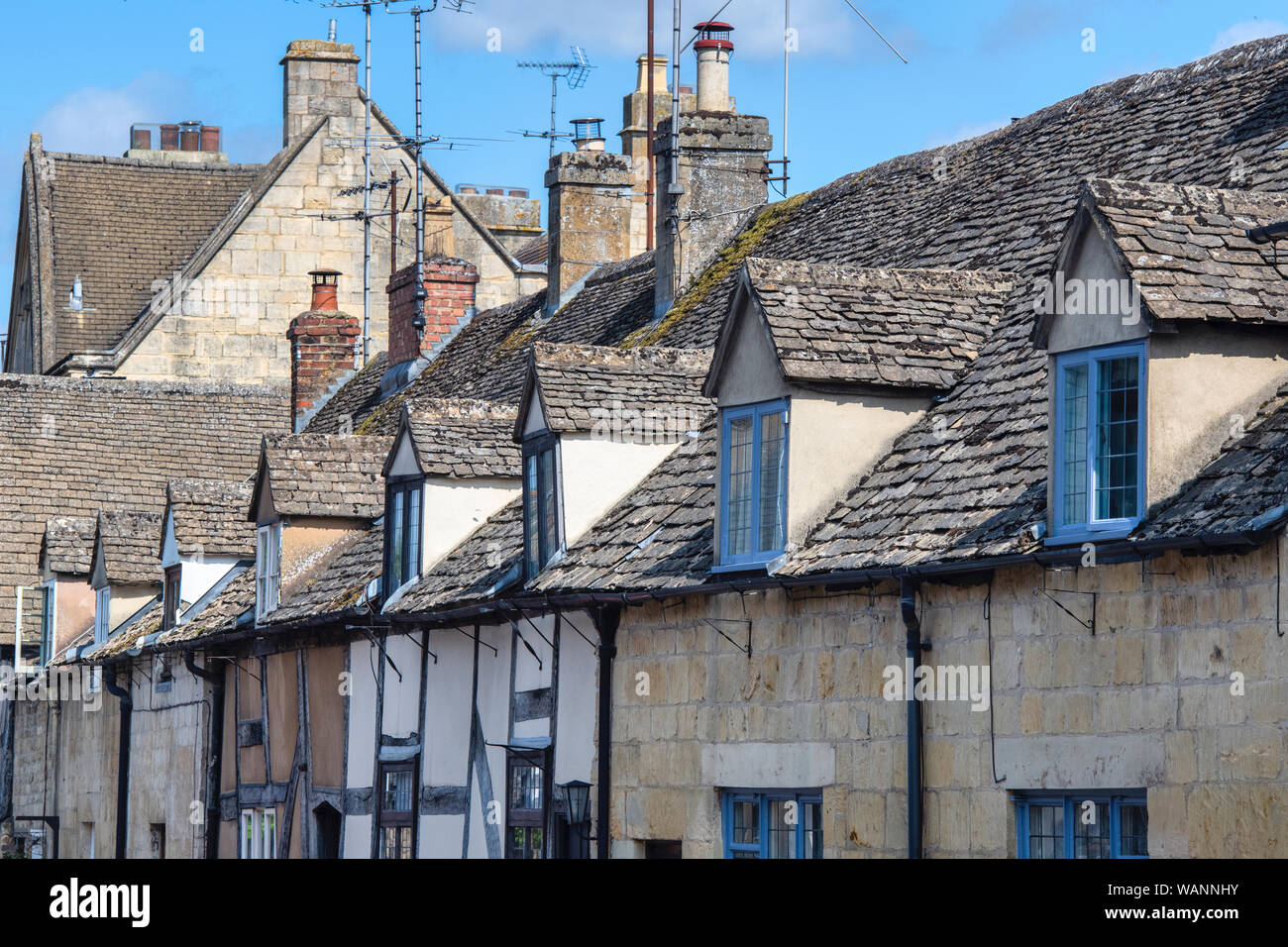 Dormer windows on cotswold stone buildings along Gloucester Street, Winchcombe, Gloucestershire, England Stock Photo
