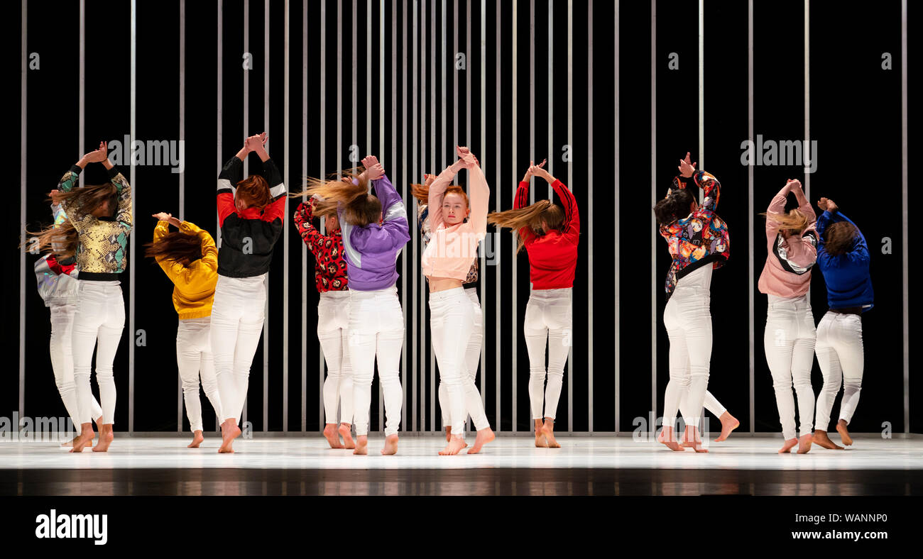 Edinburgh, Scotland, UK. 21 August 2019. Pictured; Young local dancers forming the Scottish ÒSugar ArmyÓ performing in Hard to Be Soft: A Belfast Prayer by Oona Doherty and Prime Cut Productions at the Lyceum Theatre at the Edinburgh International festival. Hard to Be Soft is a dance piece which looks behind the masks of violence and machismo to the inner lives of Belfast hard men and strong women. Cast in four episodes, Hard to Be Soft features solos from Doherty herself, a warrior-like hip-hop dance group, and a choreographed wrestling match for a male duet. Iain Masterton/Alamy Live News. Stock Photo