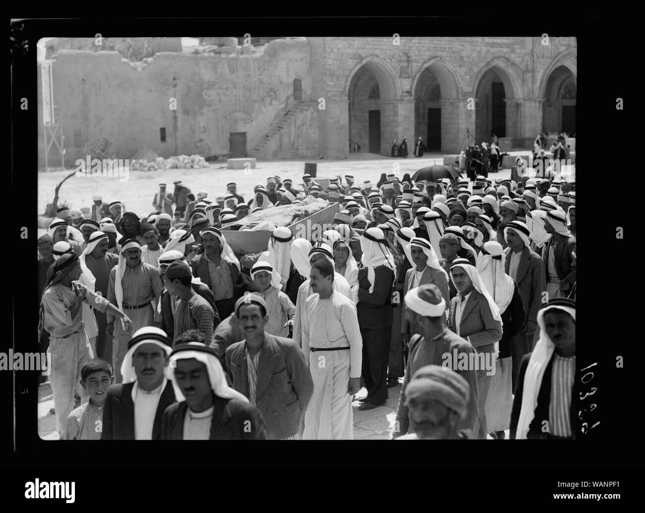 Crowds in the Mosque el-Aksa [i.e., al-Aqsa], showing a victim Stock Photo