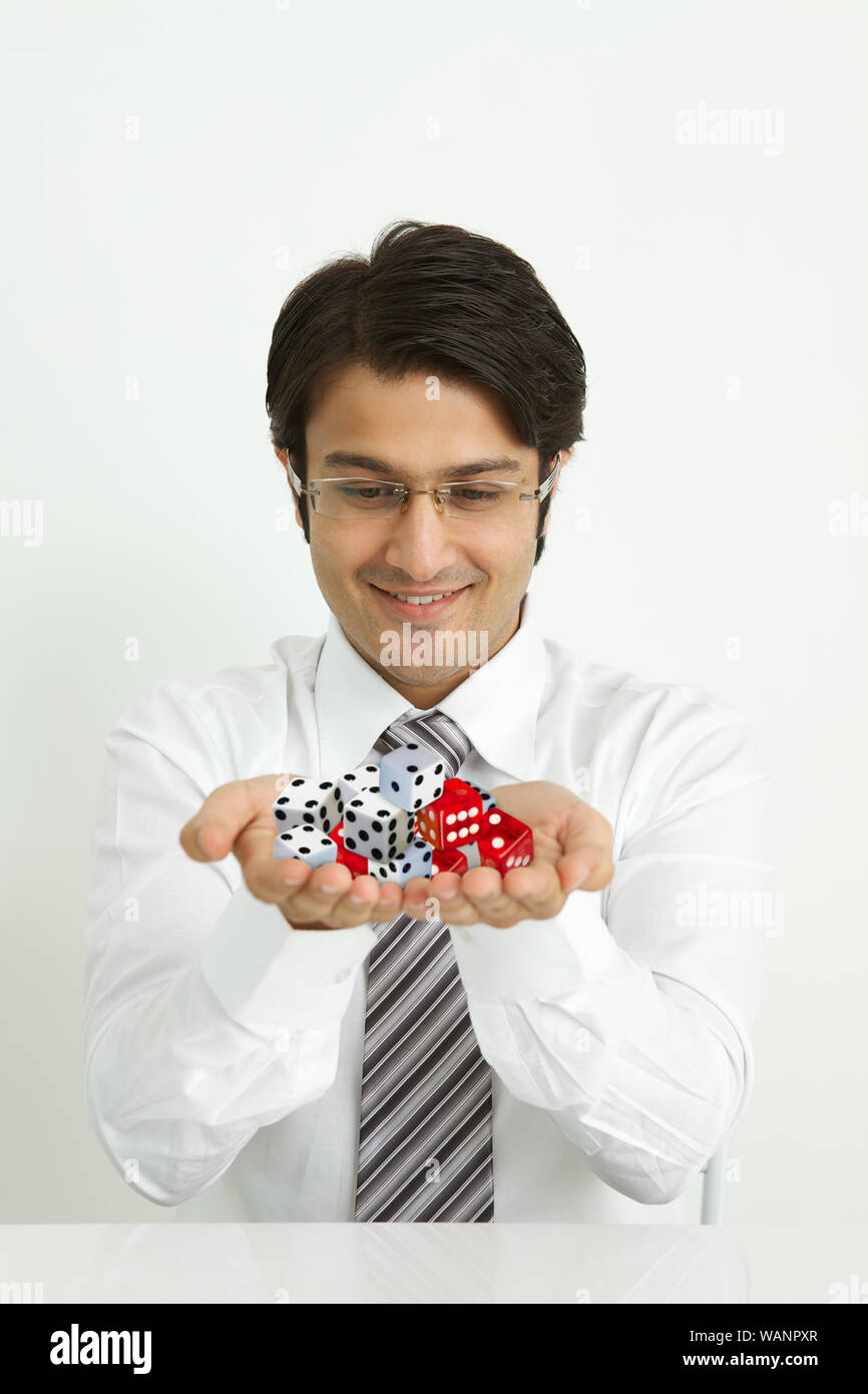 Hand with dice hires stock photography and images Alamy